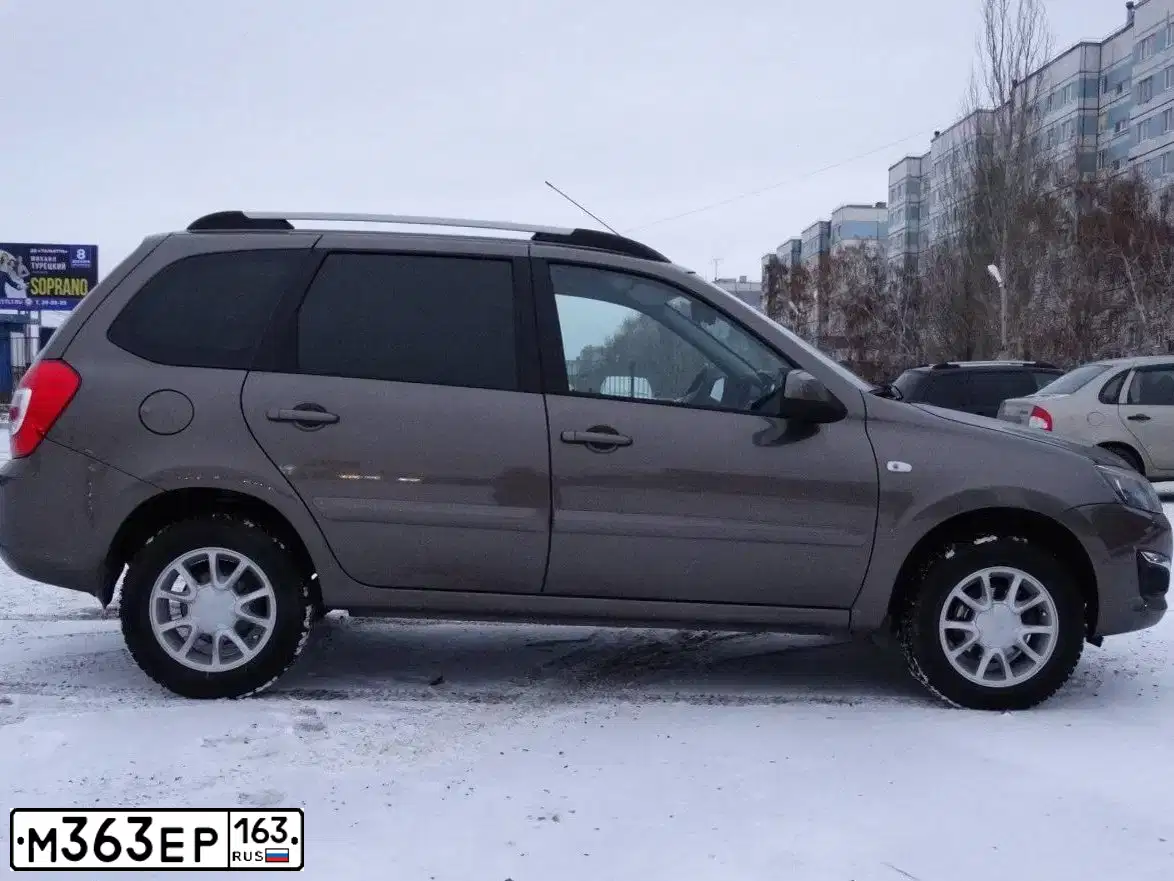 Фото автомобиля LADA 2194 KALINA, 2014 — госномер А130СК763. Цвет: Золотисто-коричневый