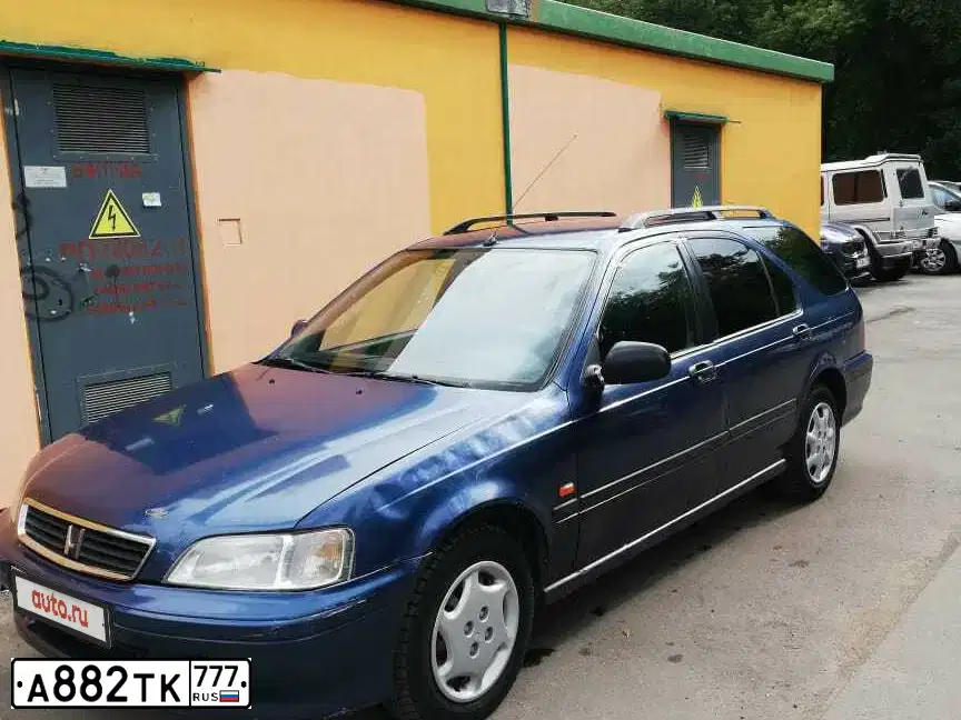 Фото автомобиля HONDA CIVIC, 1999 — госномер О425АЕ977. Цвет: синий