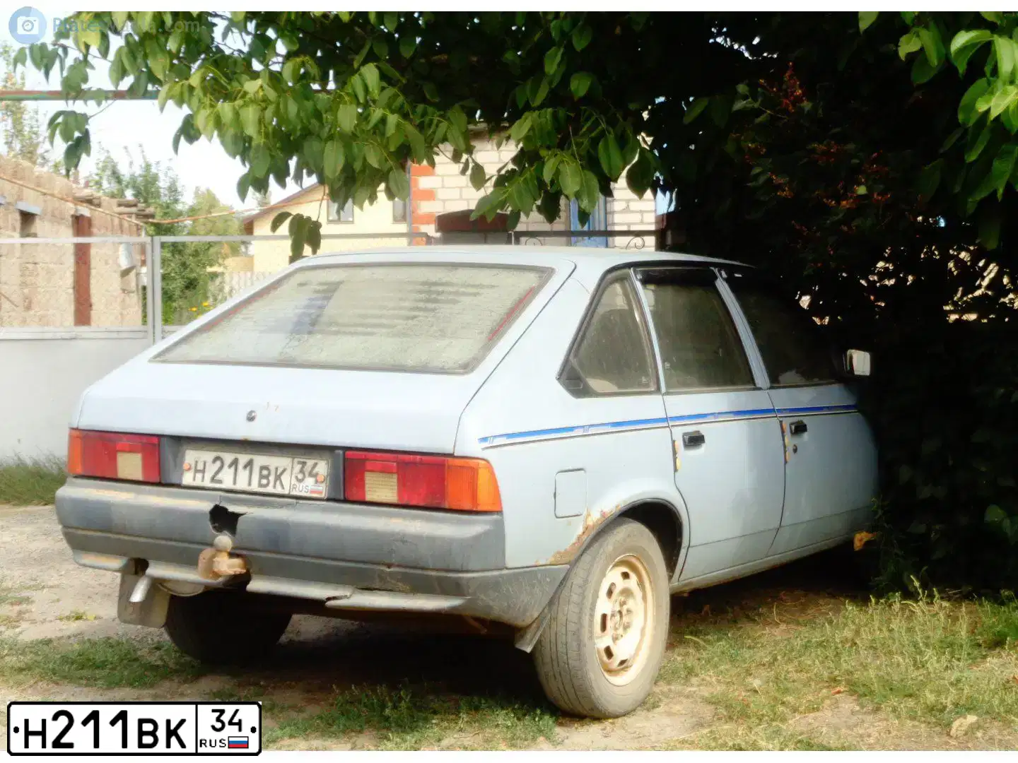 Фото автомобиля AZLK MOSKWITSCH 2141, 1997 — госномер Н211ВК34. Цвет: СЕРЫЙ