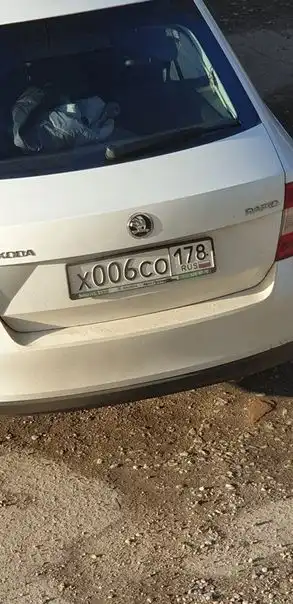 Фото автомобиля SKODA RAPID, 2017 — госномер О467РМ47. Цвет: Белый