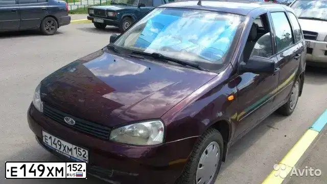 Фото автомобиля LADA 1117 KALINA, 2012 — госномер Е149ХМ152. Цвет: ТЕМНО-КРАСНЫЙ