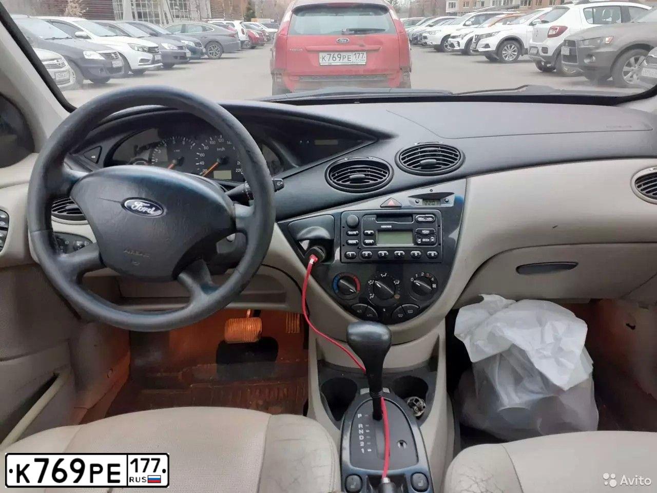 Фото автомобиля FORD FOCUS, 2007 — госномер К769РЕ177. Цвет: Красный