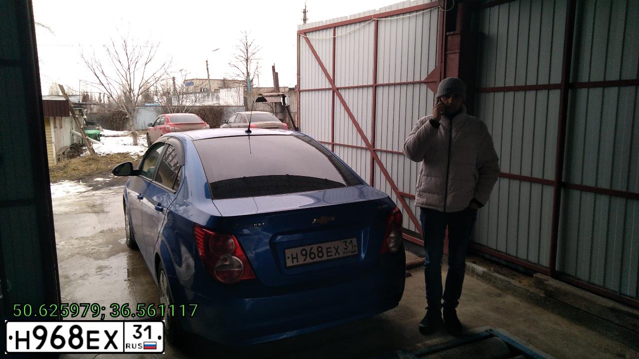 Фото автомобиля CHEVROLET AVEO, 2012 — госномер Н968ЕХ31. Цвет: синий