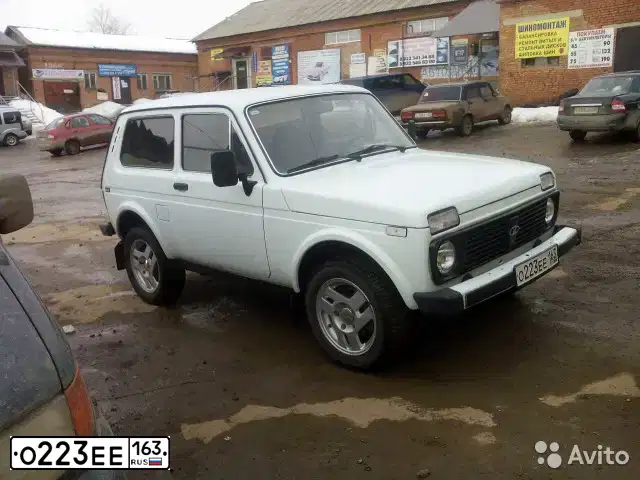 Фото автомобиля LADA 2121 NIVA, 1997 — госномер Х014СО56. Цвет: БЕЛЫЙ