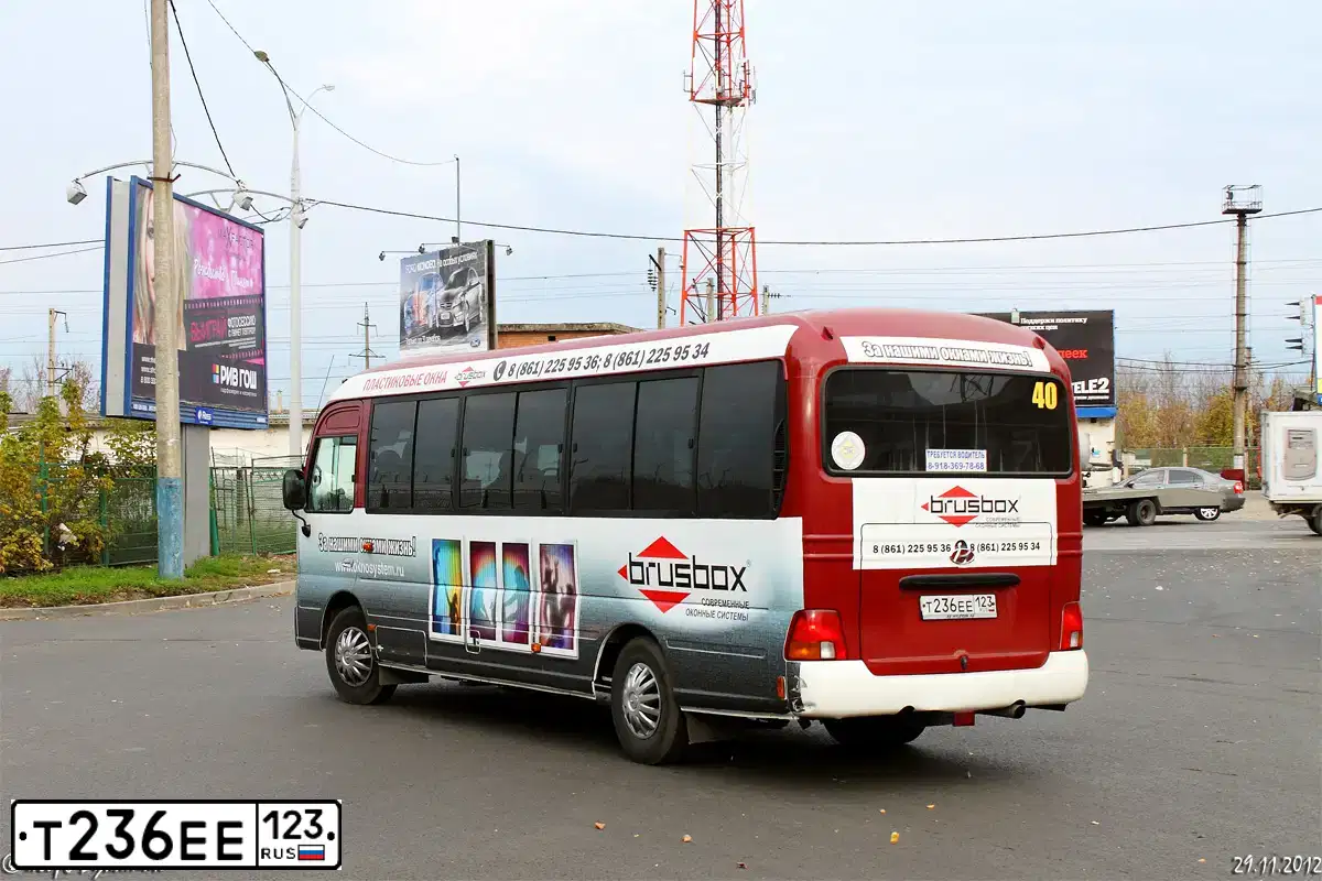 Фото автомобиля HYUNDAI COUNTY, 2011 — госномер О007АР123. Цвет: МНОГОЦВЕТНЫЙ