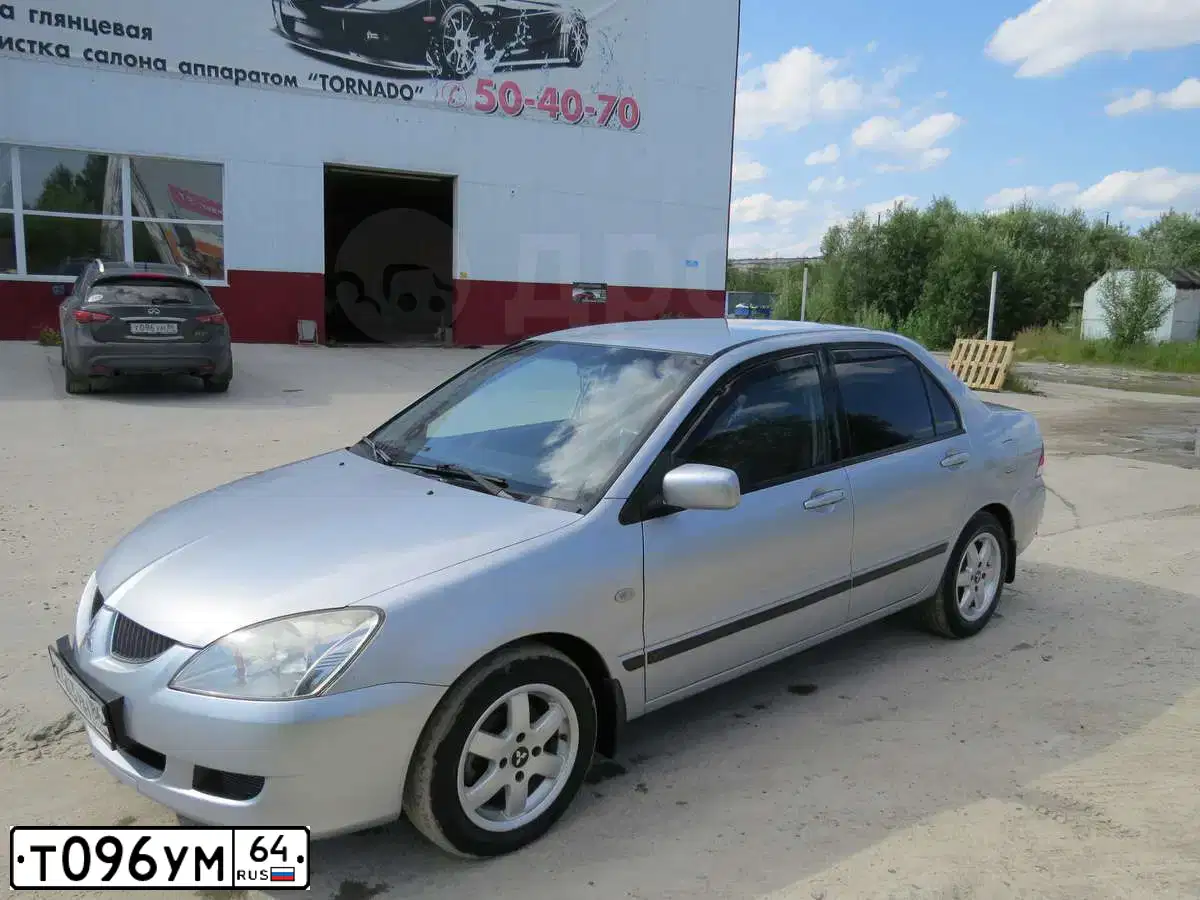 Фото автомобиля NISSAN QASHQAI, 2013 — госномер М049ЕХ164