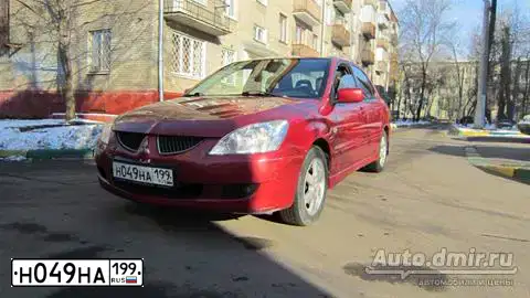 Фото автомобиля MITSUBISHI LANCER, 2004 — госномер Т066ВН550. Цвет: Красный