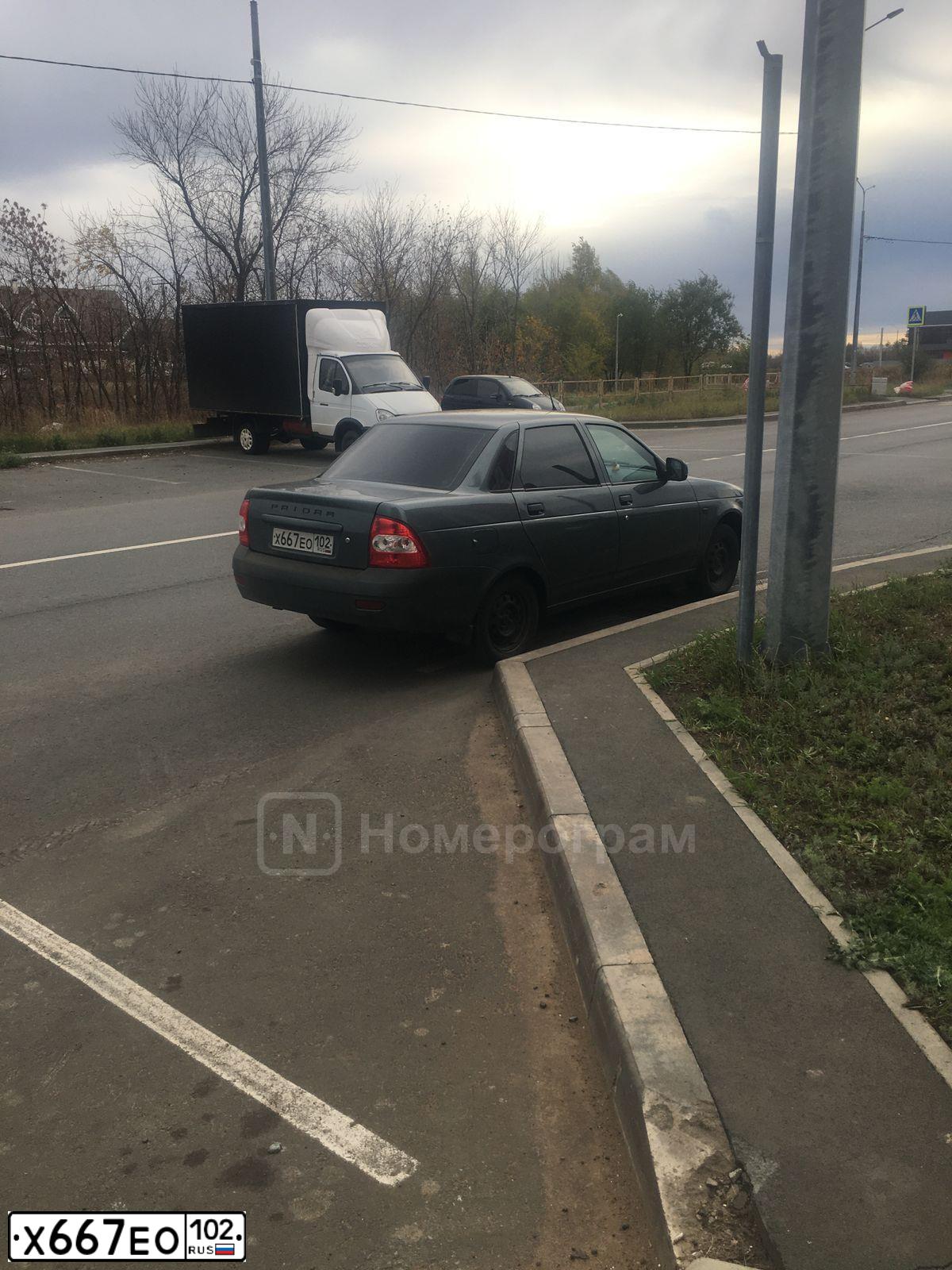 Фото автомобиля LADA PRIORA, 2012 — госномер Е052ТХ156. Цвет: СЕРО-СИНЕ-ЗЕЛЕНЫЙ