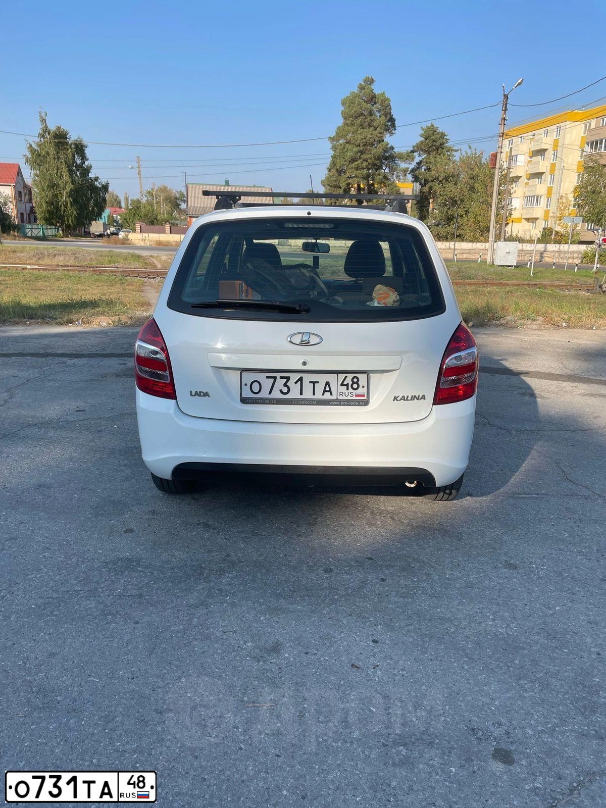 Фото автомобиля LADA KALINA, 2015 — госномер Н168НК136. Цвет: Белый
