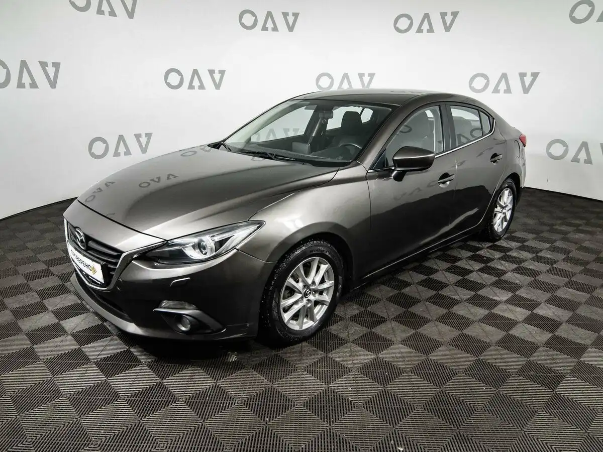 Фото автомобиля MAZDA 3, 2014 — госномер М240СТ198. Цвет: СЕРО-КОРИЧНЕВЫЙ