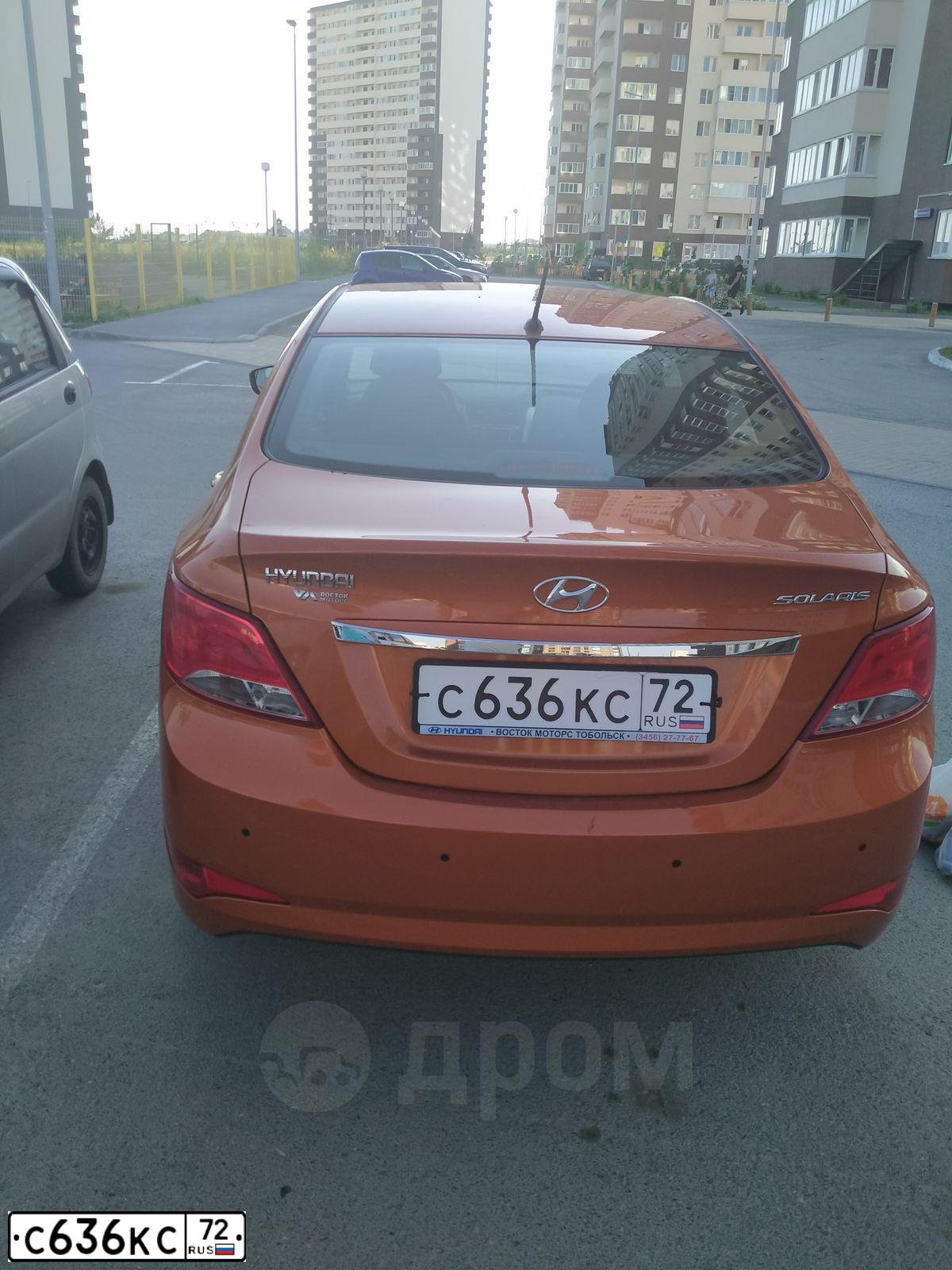 Фото автомобиля HYUNDAI SOLARIS, 2015 — госномер С636КС72. Цвет: Оранжевый