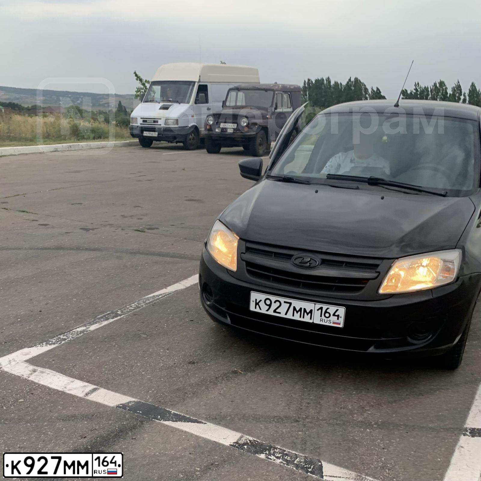 Фото автомобиля LADA 2190 GRANTA, 2012 — госномер К927ММ164. Цвет: Сине-Черный