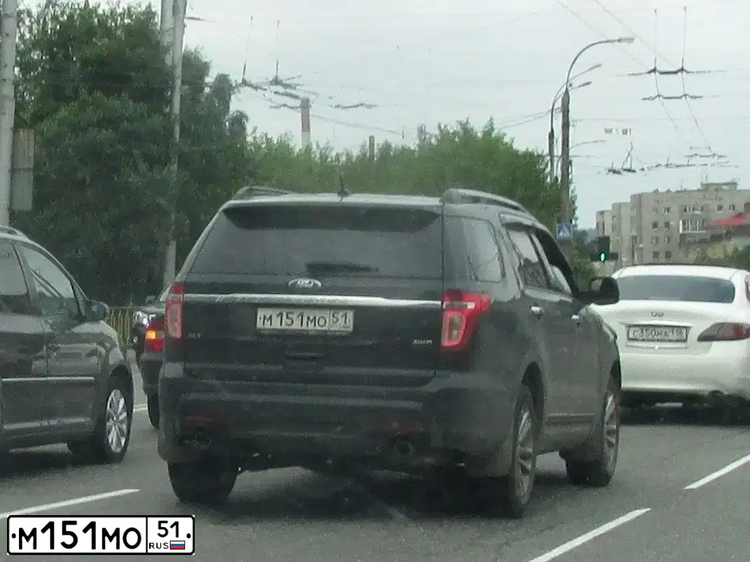 Фото автомобиля TOYOTA CARINA, 1997 — госномер М705МС51. Цвет: ЗЕЛЕНЫЙ