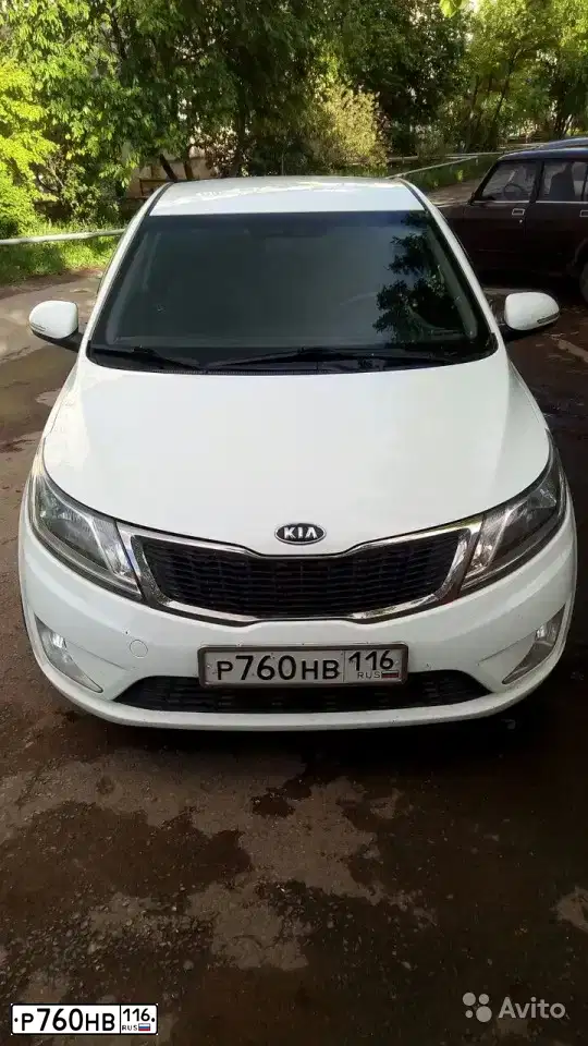 Фото автомобиля KIA RIO, 2012 — госномер Р760НВ116. Цвет: Белый