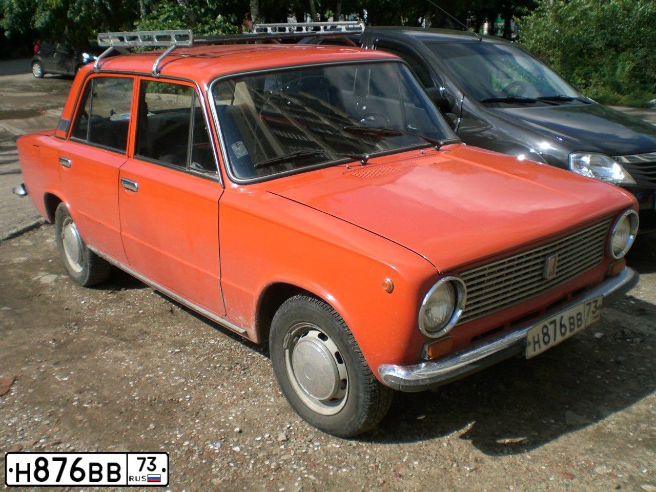 Фото автомобиля LADA 2101, 1985 — госномер Н876ВВ73. Цвет: ОРАНЖЕВЫЙ