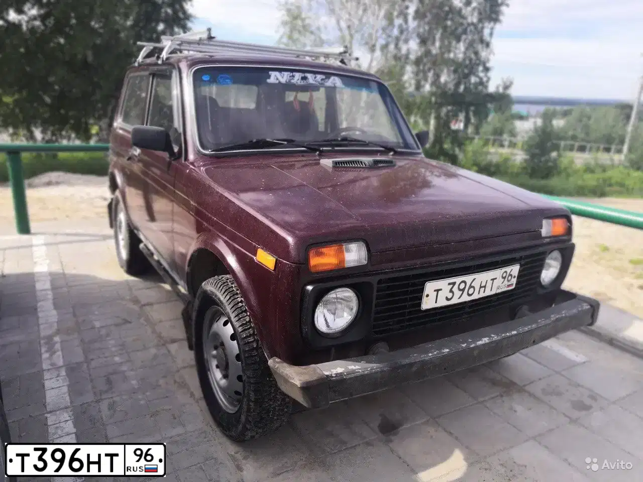 Фото автомобиля LADA 2121 NIVA, 2010 — госномер Т396НТ96. Цвет: ТЕМНО-ВИШНЕВЫЙ