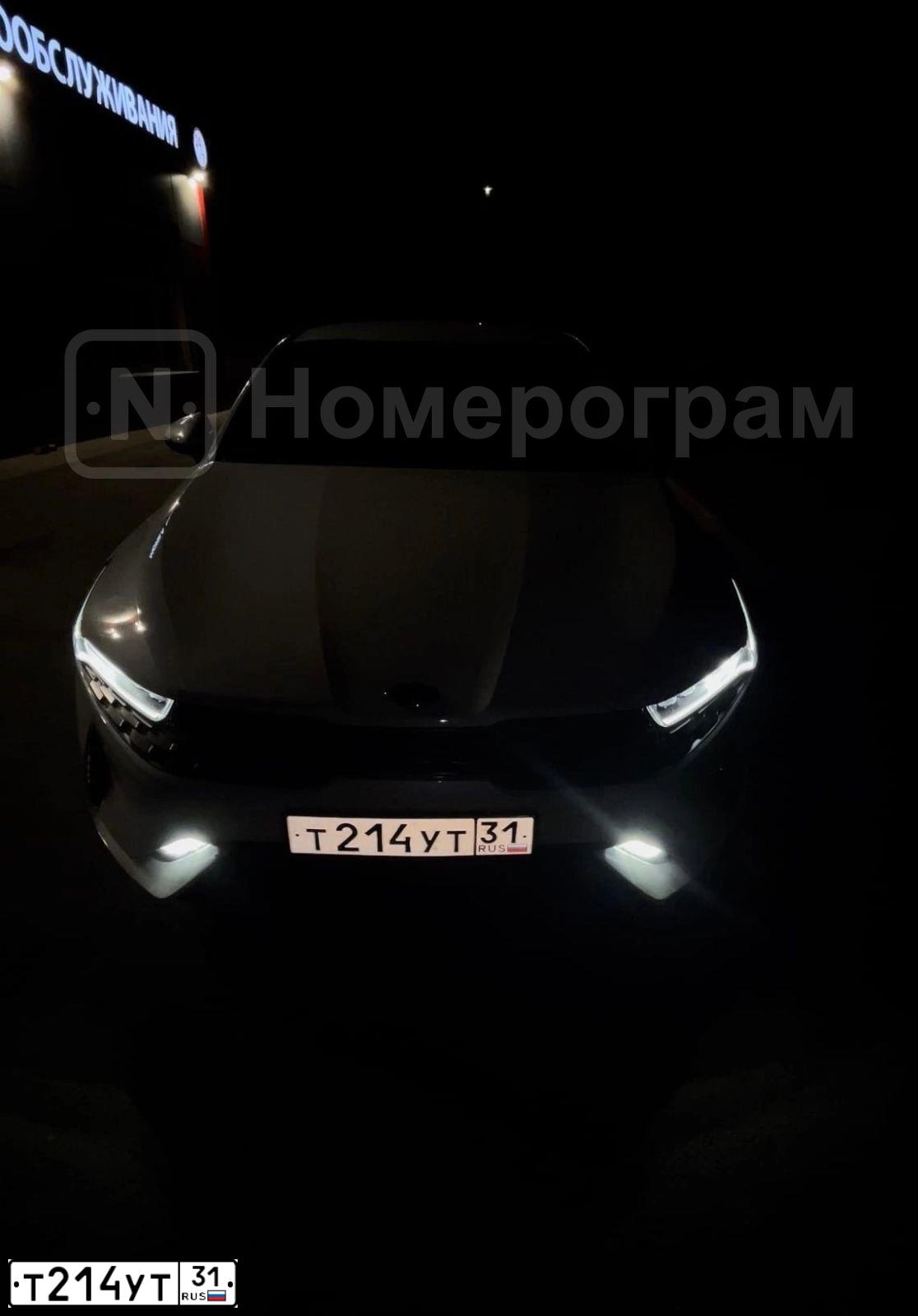 Фото автомобиля KIA K5, 2020 — госномер Т214УТ31. Цвет: Белый