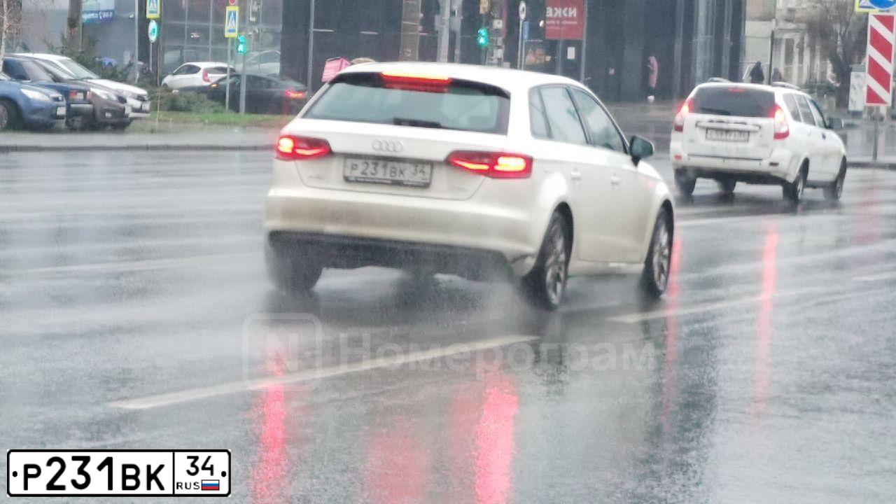 Фото автомобиля AUDI A3, 2013 — госномер Х118РС31. Цвет: Белый