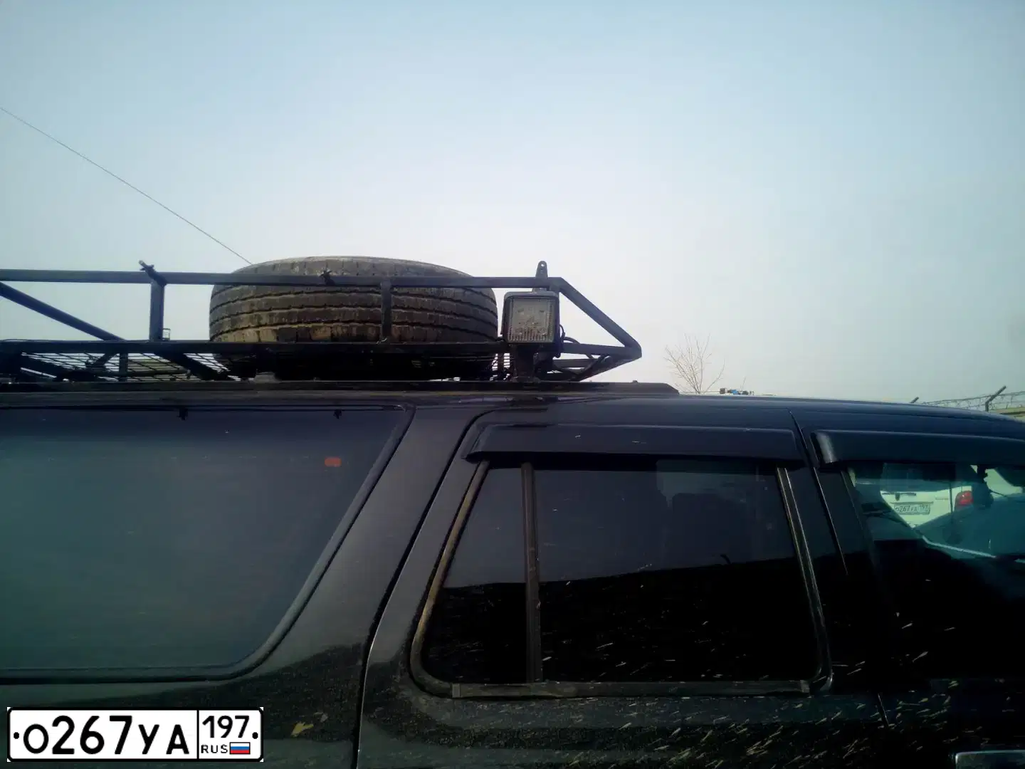 Фото автомобиля SSANGYONG REXTON, 2012 — госномер О267УА197. Цвет: БЕЛЫЙ