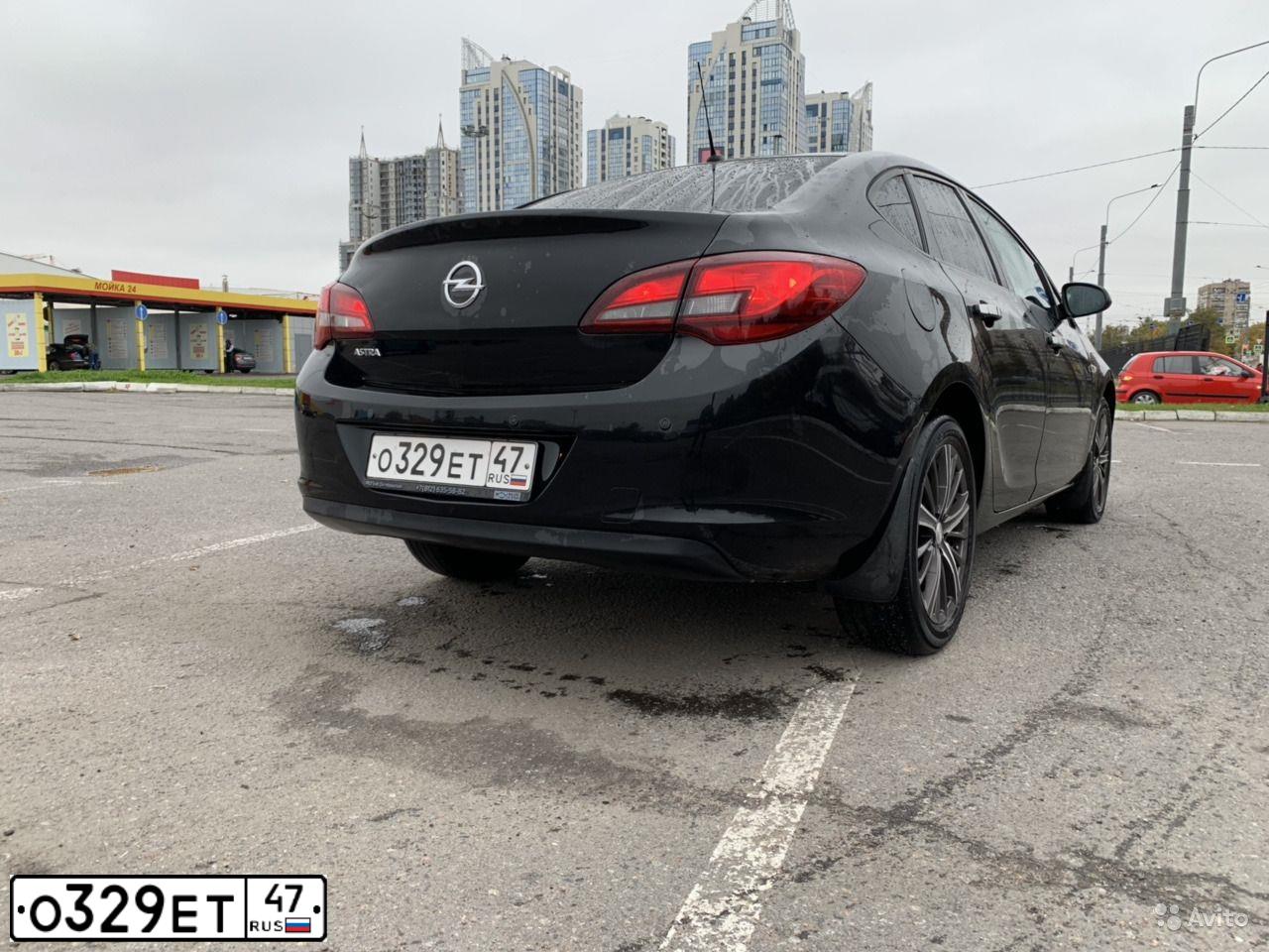 Фото автомобиля OPEL ASTRA, 2012 — госномер О329ЕТ47. Цвет: ЧЕРНЫЙ