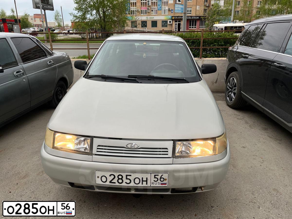 Фото автомобиля LADA 2112, 2004 — госномер О285ОН56. Цвет: МОЛОЧНО-БЕЛЫЙ СЕРЕБРИСТЫЙ