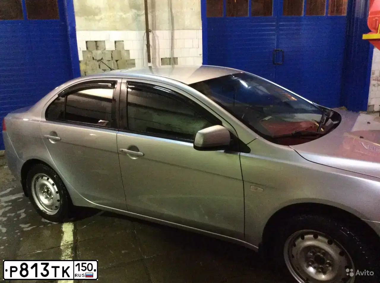 Фото автомобиля MITSUBISHI LANCER, 2008 — госномер Р813ТК150. Цвет: СЕРЕБРИСТЫЙ