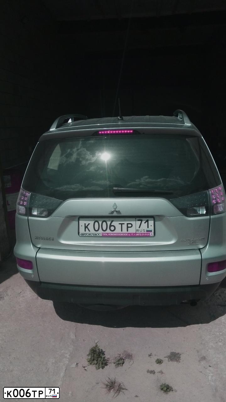 Фото автомобиля MITSUBISHI OUTLANDER, 2010 — госномер К006ТР71. Цвет: СРЕБРИСТЫЙ