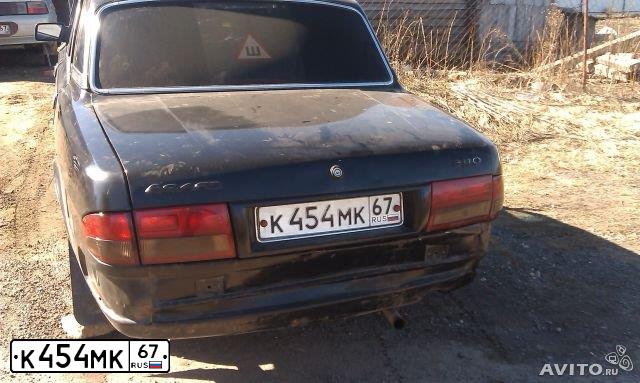 Фото автомобиля GAZ 3110 WOLGA, 1997 — госномер К010АН67. Цвет: ЧЕРНЫЙ