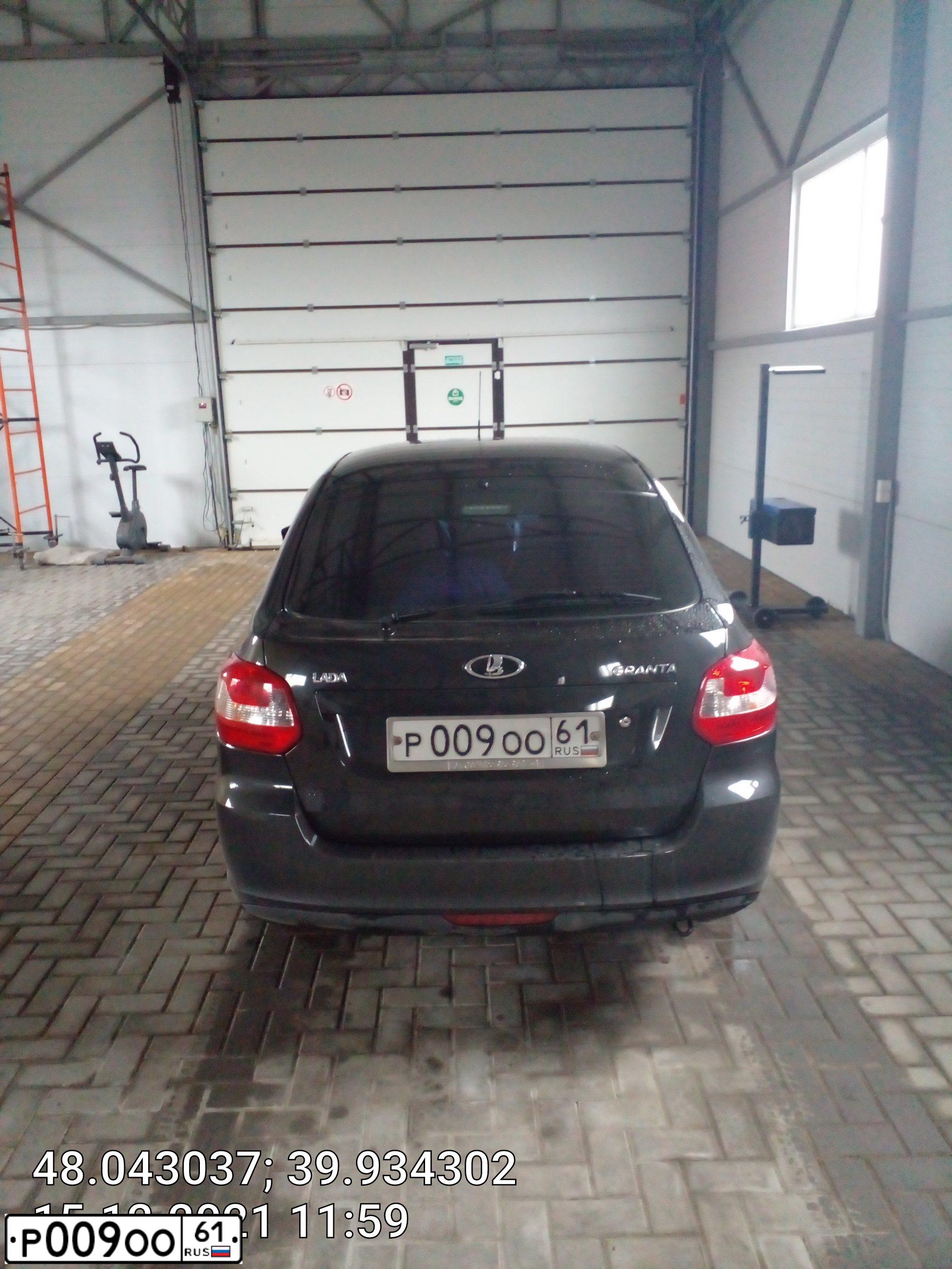 Фото автомобиля LADA 2191 GRANTA, 2014 — госномер Р009ОО61. Цвет: ЧЕРНЫЙ
