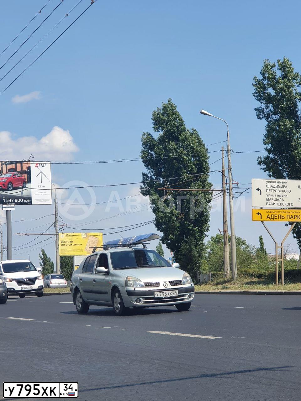 Фото автомобиля RENAULT SYMBOL, 2004 — госномер У795ХК34. Цвет: СВЕТЛО СЕРО-ГОЛУБОЙ