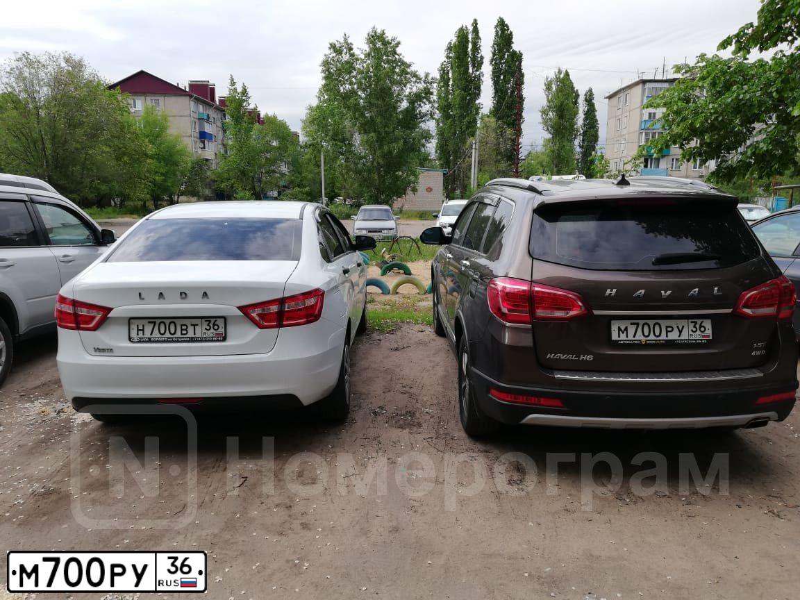 Фото автомобиля FORD FOCUS, 2005 — госномер К228ЕК136. Цвет: ЧЕРНЫЙ