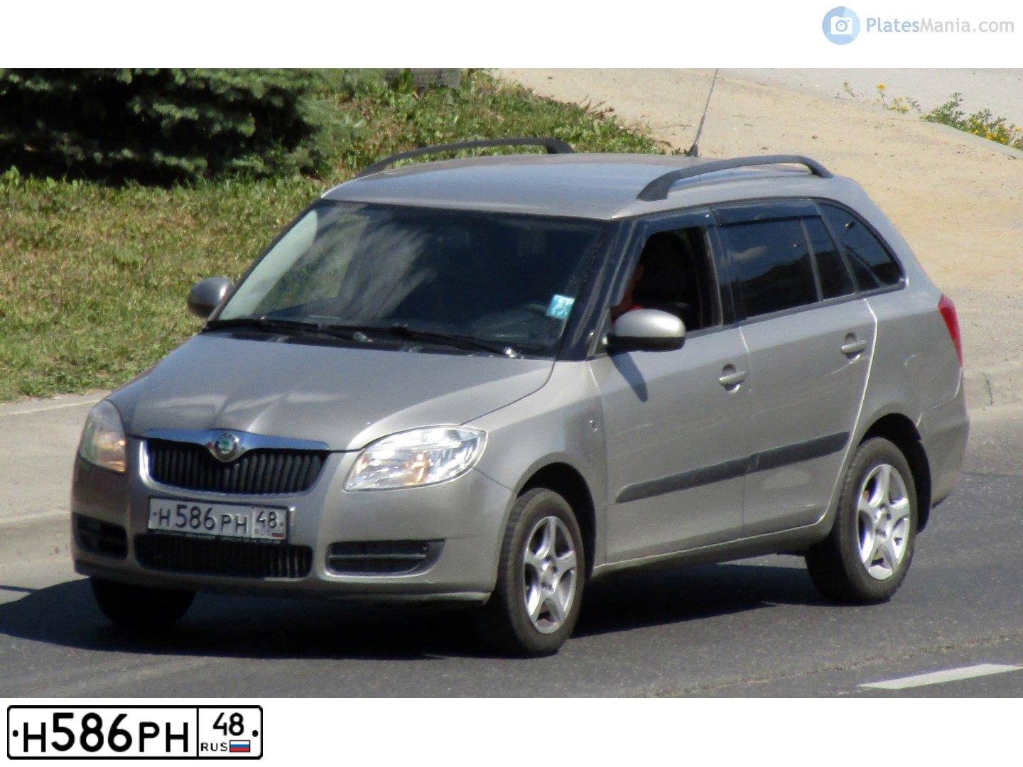 Фото автомобиля SKODA FABIA, 2009 — госномер Н586РН48. Цвет: СЕРЫЙ