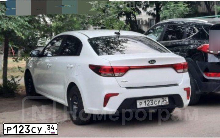 Фото автомобиля KIA RIO, 2019 — госномер У636МТ30. Цвет: Белый