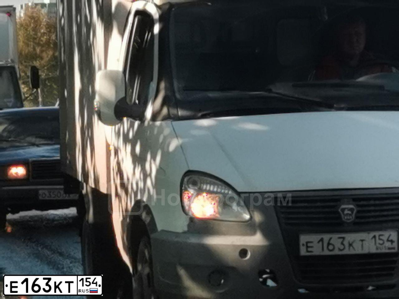 Фото автомобиля GAZ 3302 EL, 2009 — госномер Р807ЕН154. Цвет: Белый