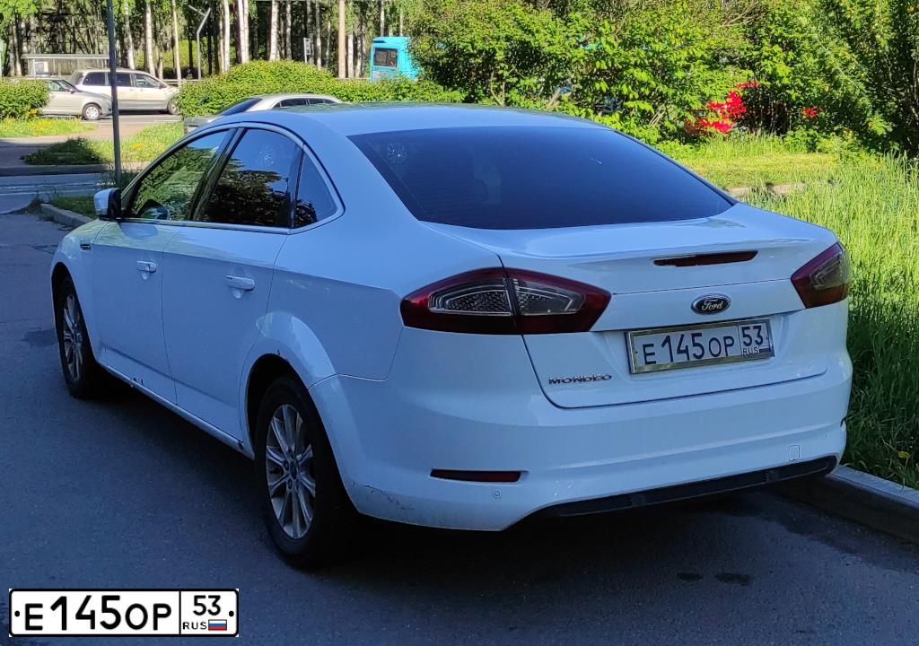 Фото автомобиля FORD MONDEO, 2011 — госномер Е145ОР53. Цвет: БЕЛЫЙ