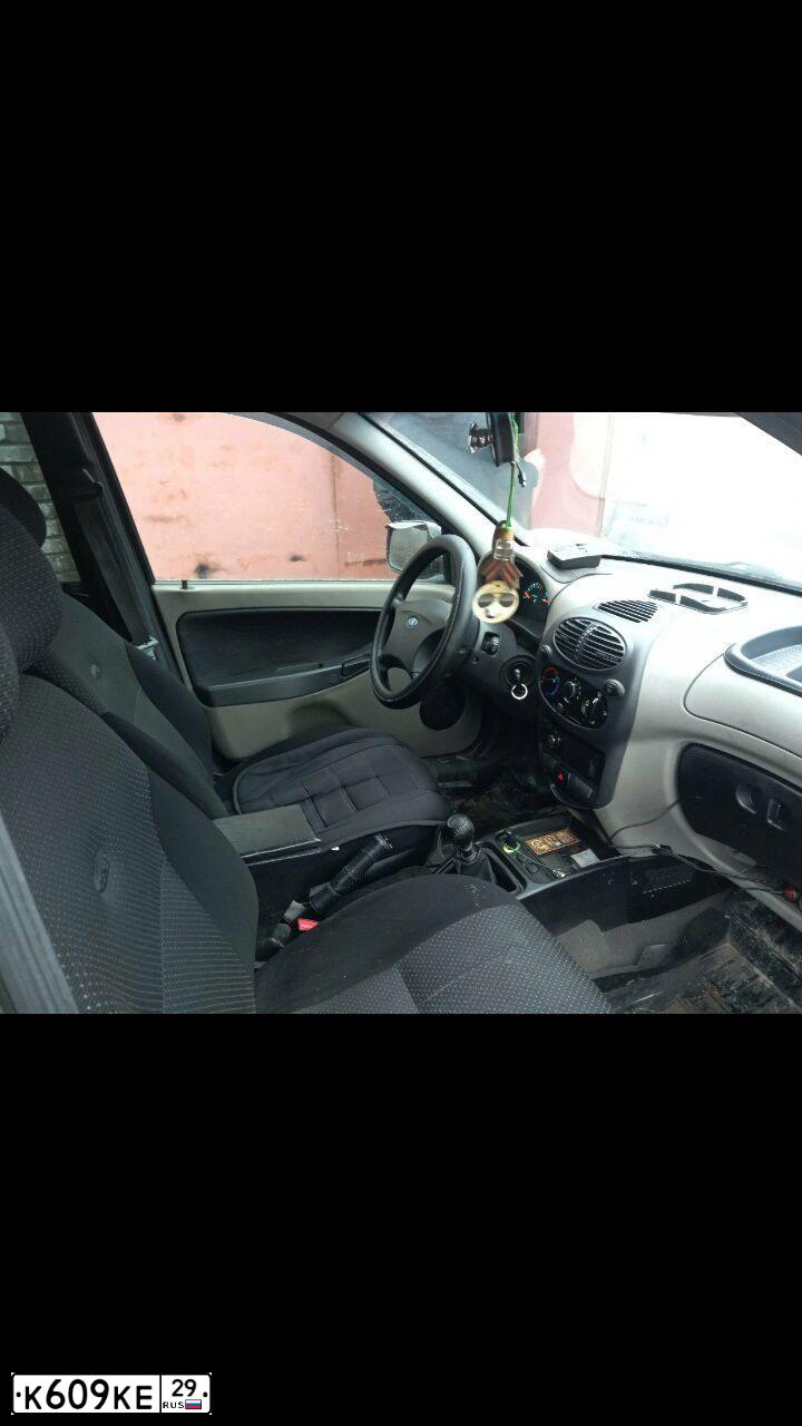 Фото автомобиля LADA 1119 KALINA, 2012 — госномер К609КЕ29. Цвет: Сине-Черный