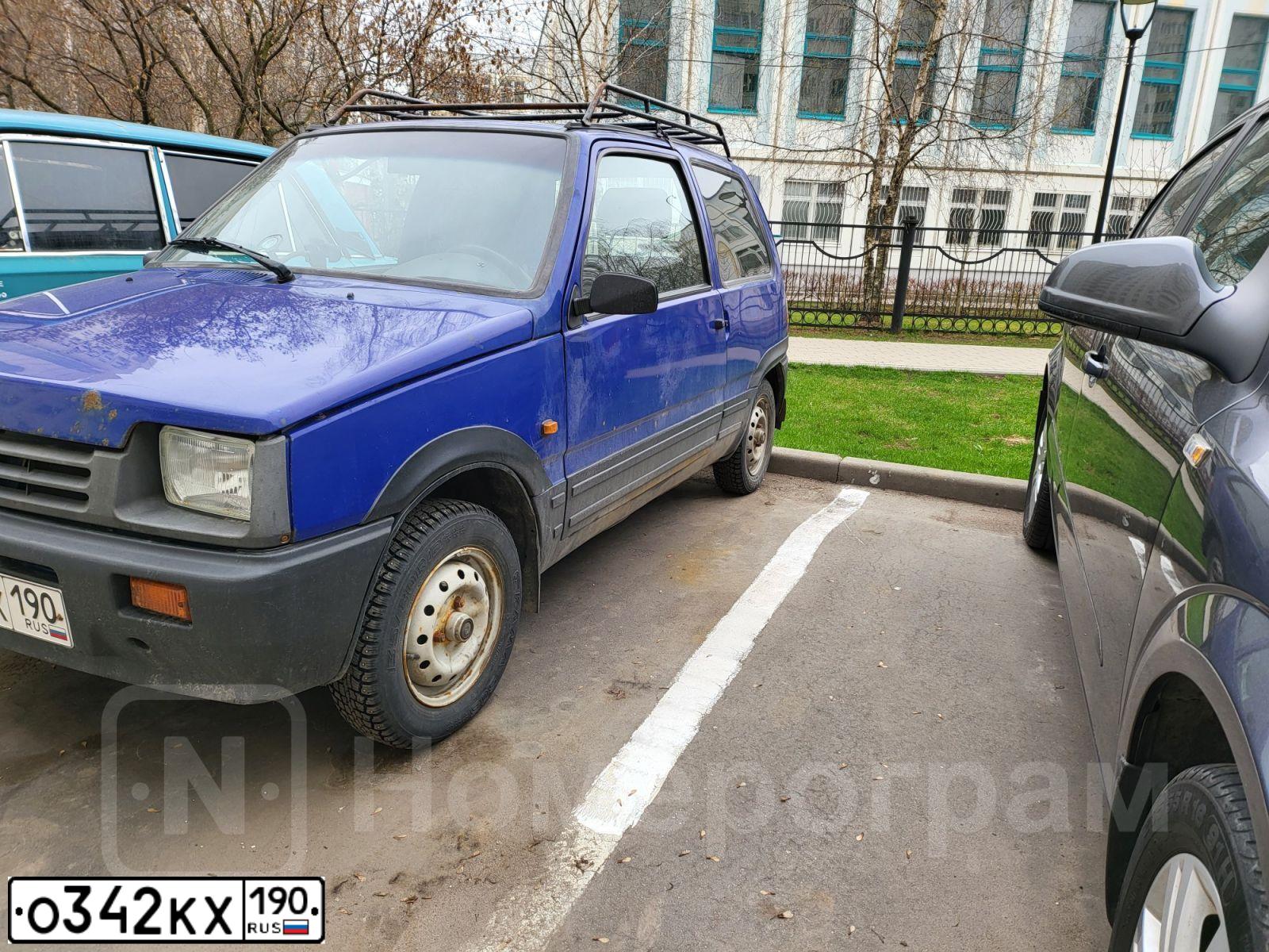 Фото автомобиля SEAZ OKA, 2004 — госномер О342КХ190. Цвет: СИНИЙ