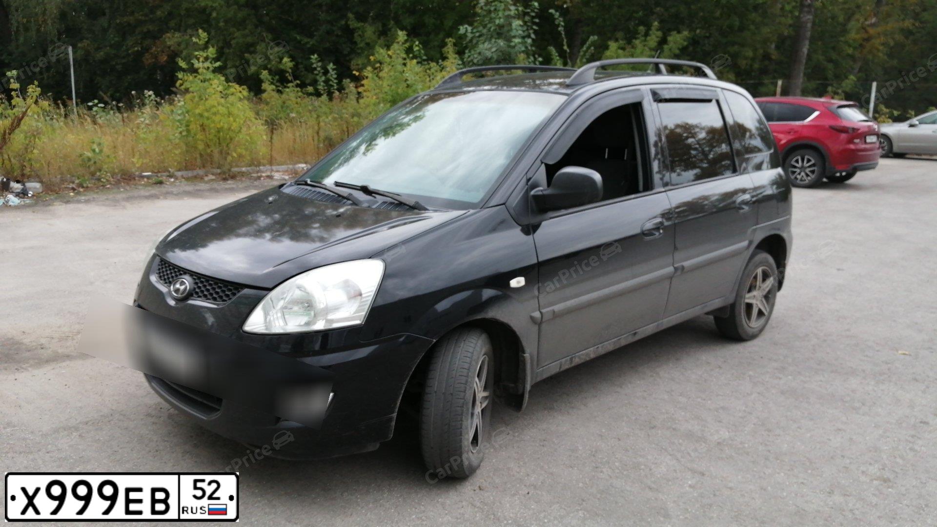 Фото автомобиля HYUNDAI MATRIX, 2009 — госномер Т324СО152. Цвет: ЧЕРНЫЙ