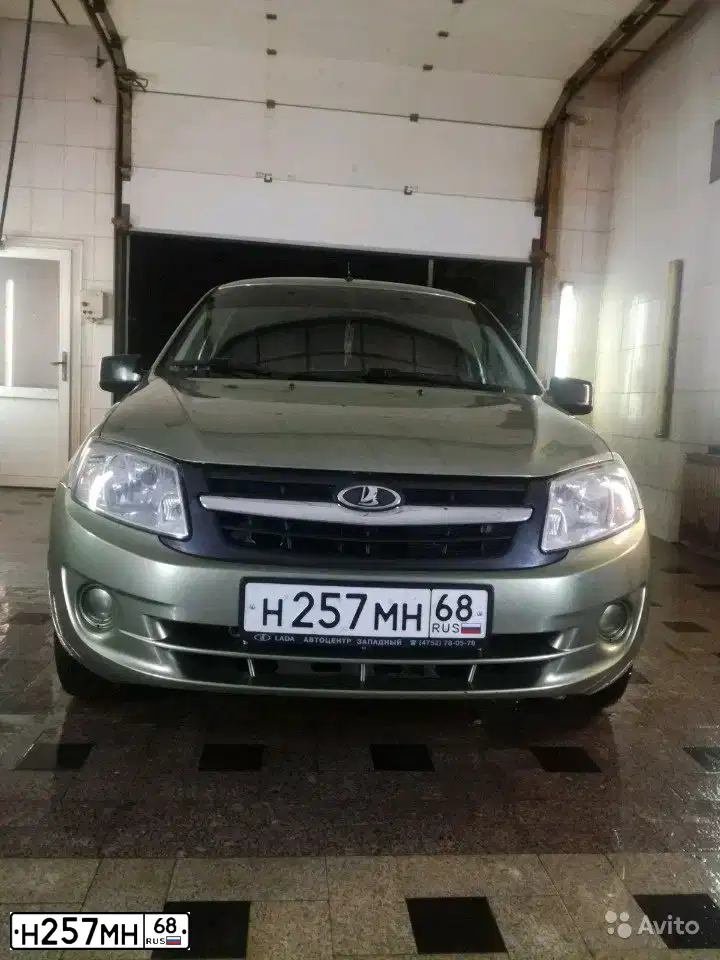Фото автомобиля LADA 2190 GRANTA, 2013 — госномер Н257МН68. Цвет: ЗЕЛЕНЫЙ