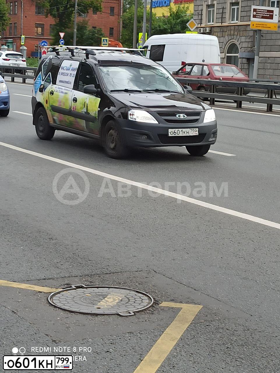 Фото автомобиля LADA LARGUS, 2018 — госномер О601КН799. Цвет: ТЕМНО-КОРИЧНЕВЫЙ