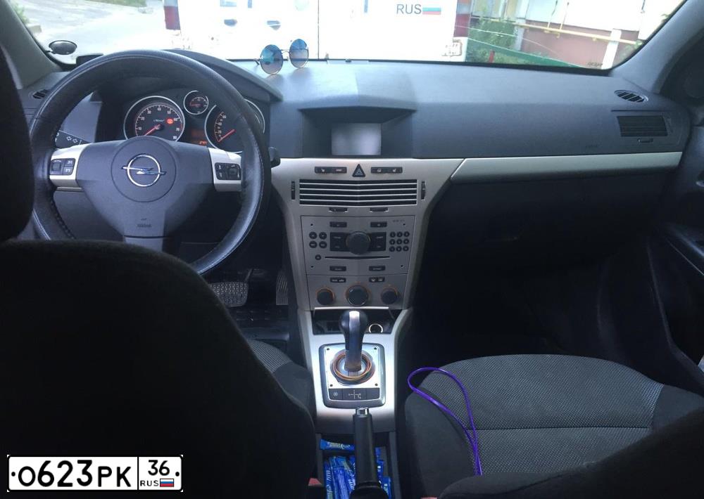 Фото автомобиля OPEL ASTRA, 2009 — госномер Н866ВМ82. Цвет: ЧЕРНЫЙ