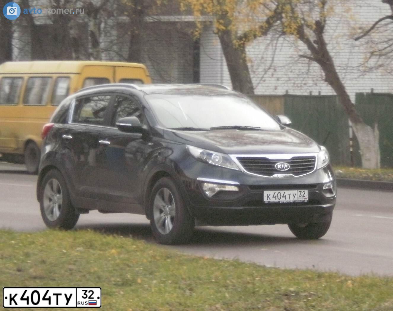 Фото автомобиля KIA SPORTAGE, 2010 — госномер С331УН70. Цвет: ЧЕРНЫЙ