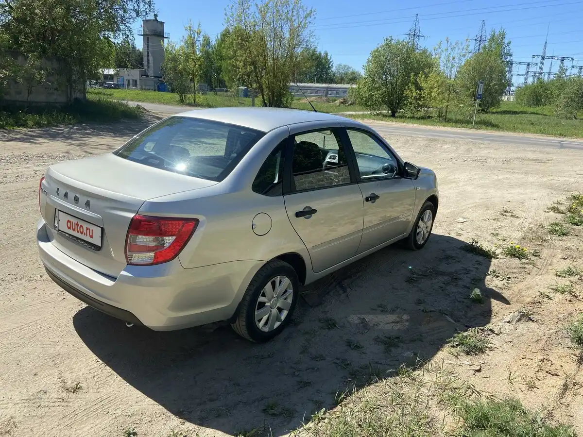 Фото автомобиля LADA 2190 GRANTA, 2019 — госномер Н094СР69. Цвет: СЕРЫЙ