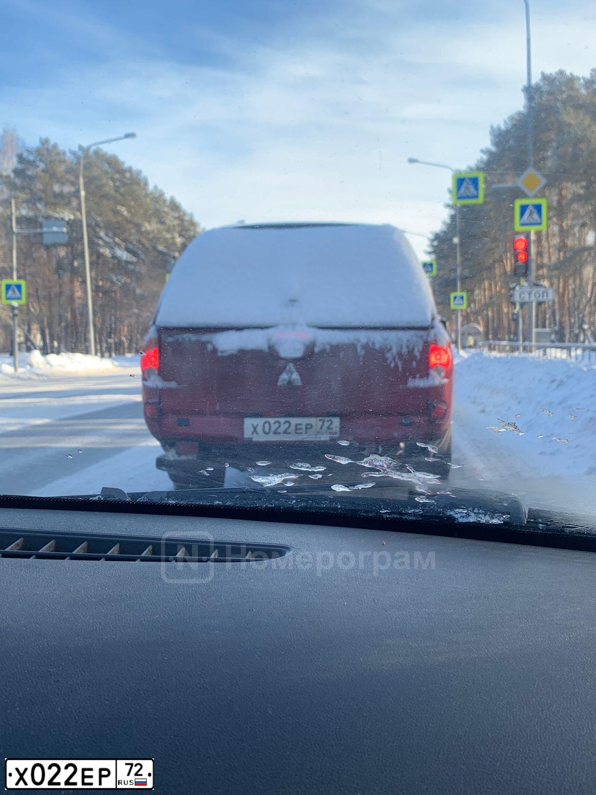 Фото автомобиля MITSUBISHI L 200, 2008 — госномер Х022ЕР72. Цвет: Красный