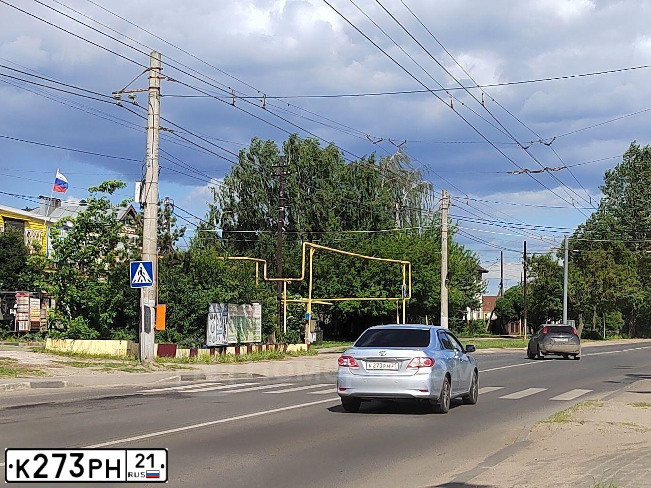 Фото автомобиля TOYOTA COROLLA, 2011 — госномер К273РН21. Цвет: СВЕТЛО-ГОЛУБОЙ