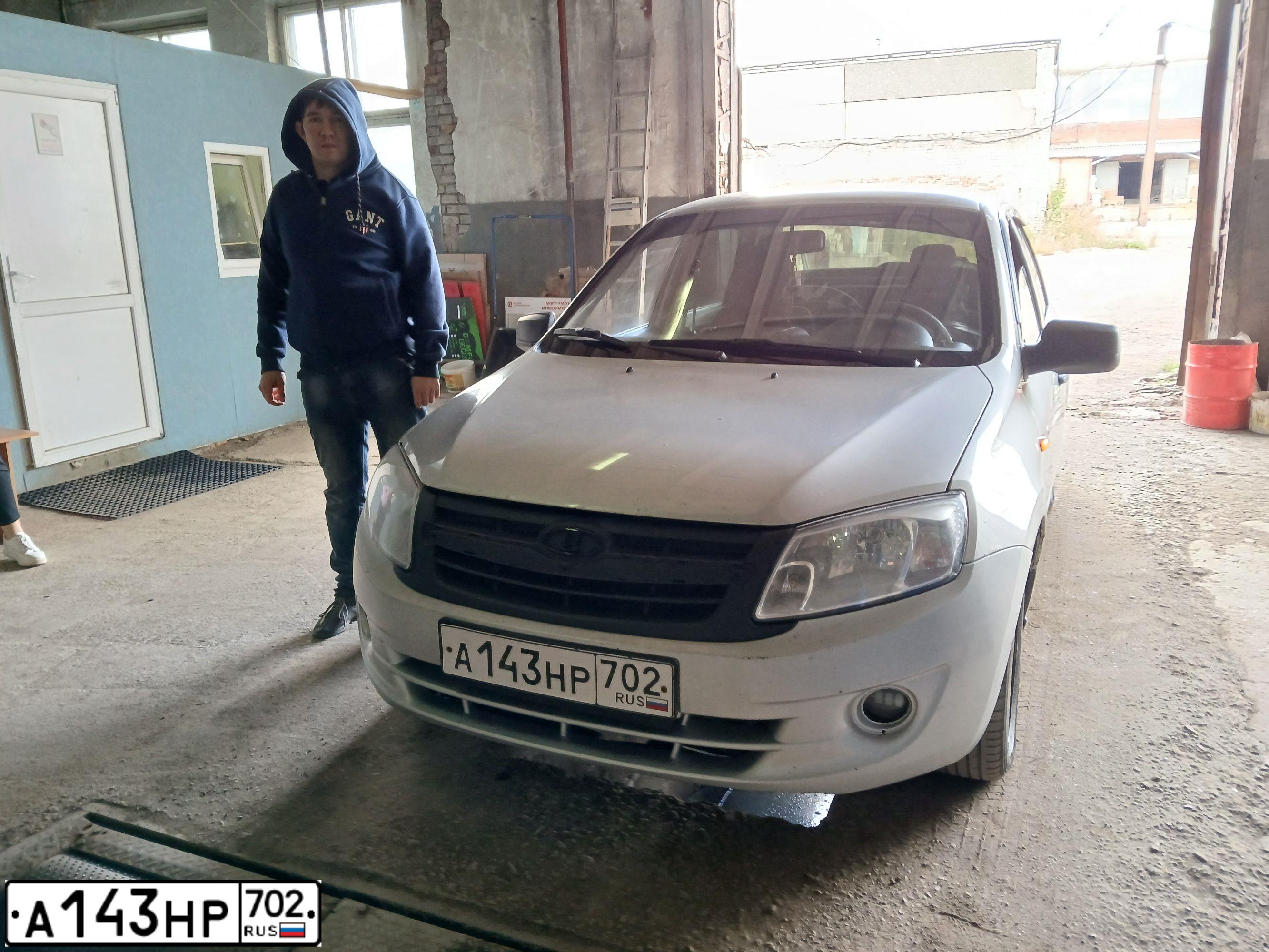 Фото автомобиля LADA GRANTA, 2012 — госномер Н209КМ702. Цвет: СЕРЕБРИСТЫЙ