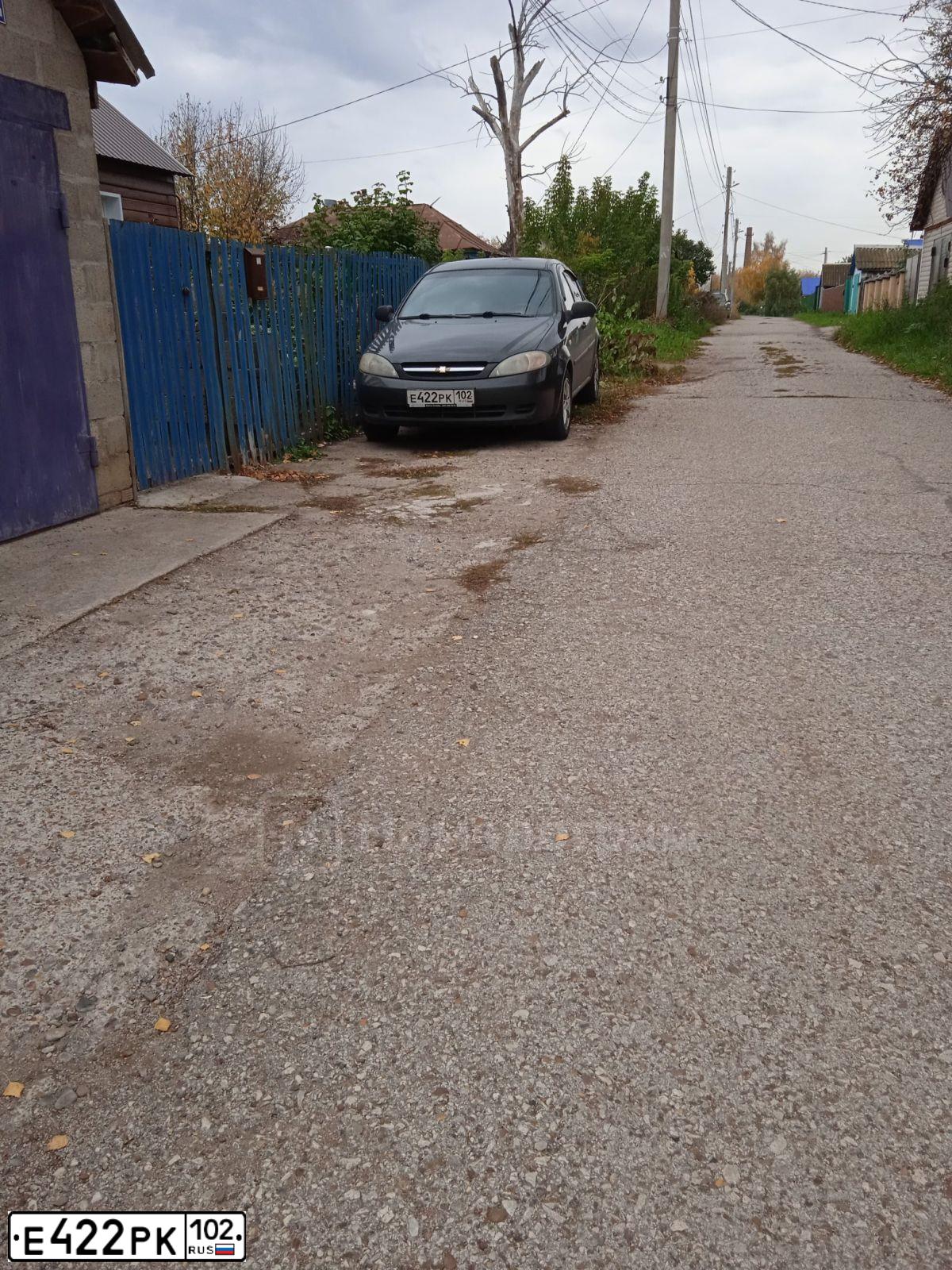Фото автомобиля CHEVROLET LACETTI, 2008 — госномер Е422РК102. Цвет: ЧЕРНЫЙ