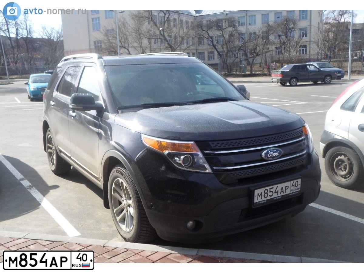Фото автомобиля FORD EXPLORER, 2012 — госномер А171КЕ977. Цвет: Черный янтарь