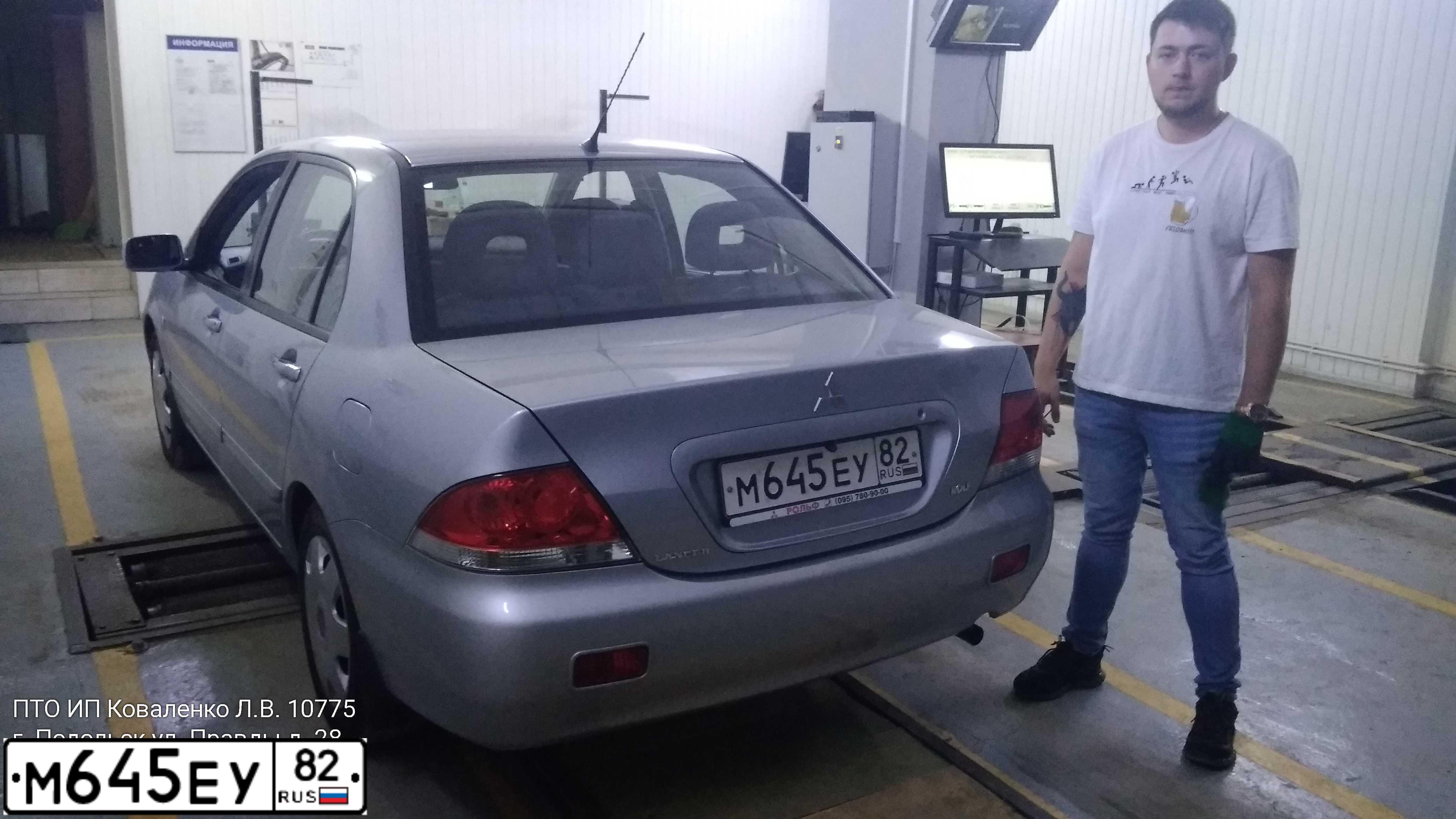 Фото автомобиля MITSUBISHI LANCER, 2005 — госномер Х131ОО799. Цвет: СЕРЫЙ МЕТАЛЛИК