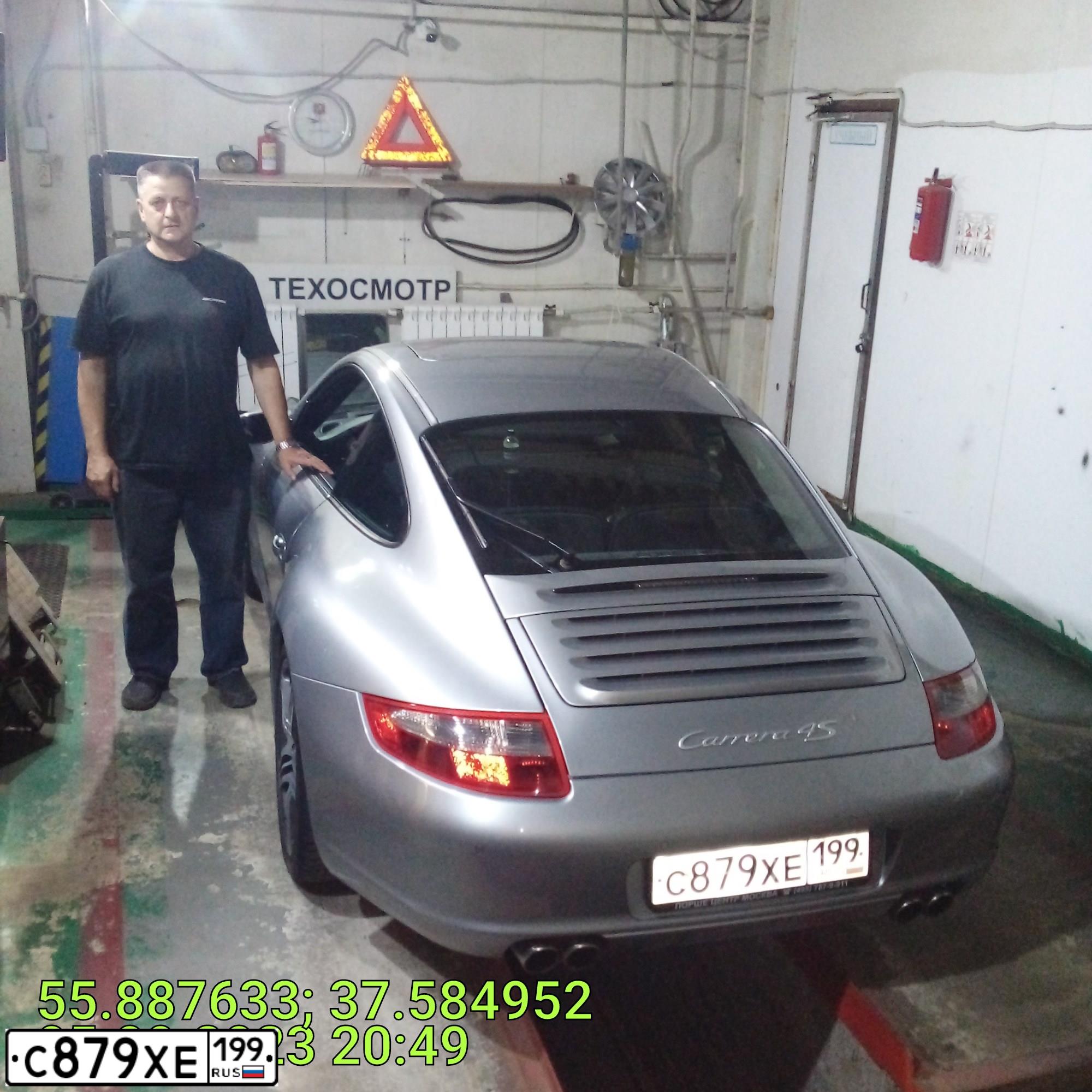 Фото автомобиля PORSCHE 911 CARRERA, 2008 — госномер С879ХЕ199. Цвет: Серебристый
